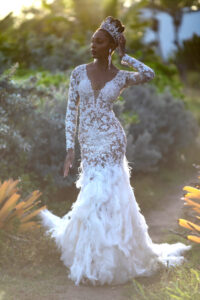 young woman in ballroom gown in the garden